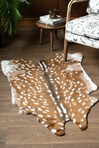 Lifestyle image of the Faux Deer Hide Rug