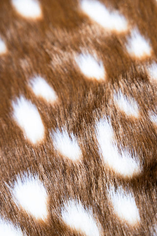 Close-up image of the Faux Deer Hide Rug