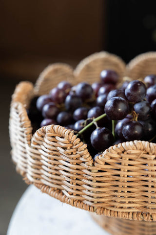 Detail image of the Footed Round Rattan Scalloped Display Stand