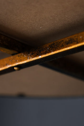 Image of the underneath of the Four-Tier Gold Round Mirrored Shelves