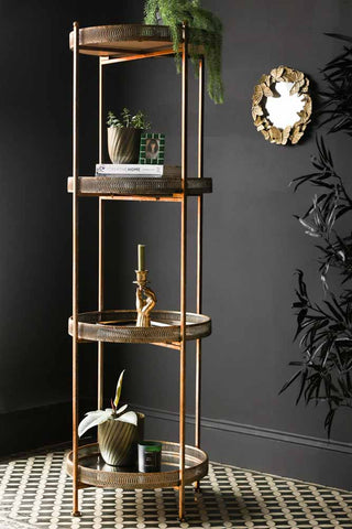 Lifestyle image of the Four-Tier Gold Round Mirrored Shelves