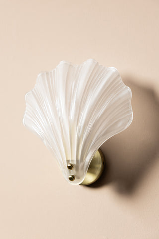 Stunning Frosted Glass Shell Wall Light shown with the light off against a beige wall