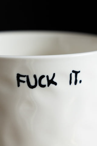 Image of the text on the Fuck It Mug