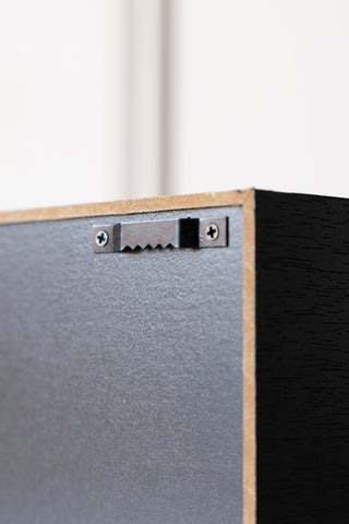 The fixing on the back of the Fuck Off Light Box.