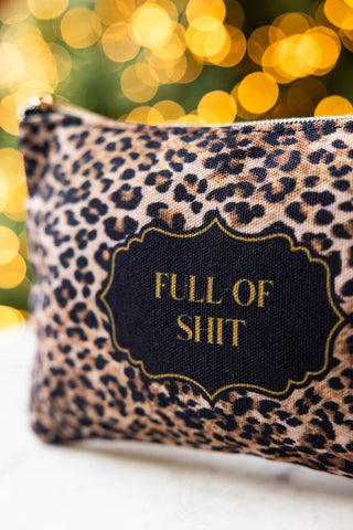 The side detail of the Full of Shit Leopard Print Canvas Pouch. 