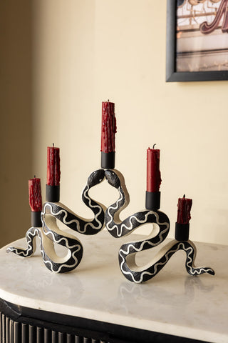 Lifestyle image of the Gemini Snake Candelabra