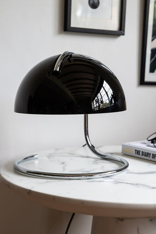 Lifestyle image of the Retro Black Glass Table Lamp