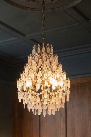 Lifestyle image of the Gold Antique-Style Frosted Glass Teardrop Chandelier in a room setting