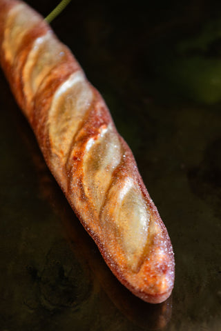 Close-up image of the Gold Baguette Glass Christmas Tree Decoration