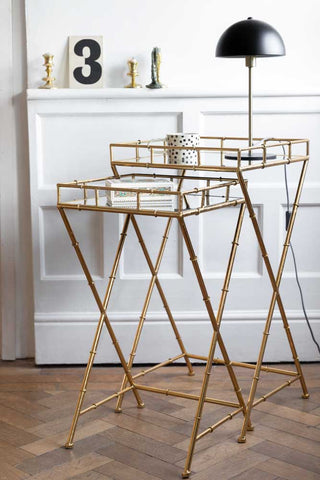 Lifestyle image of the Gold Bamboo Design Nest Of Tables