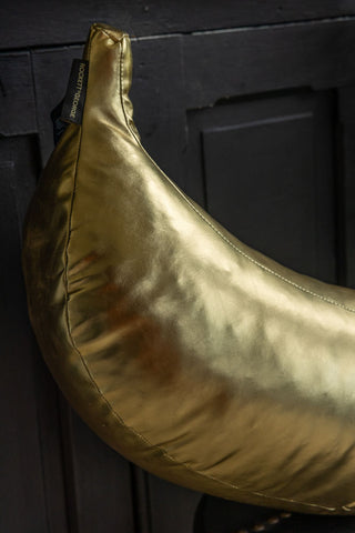 Close-up image of the Gold Banana Cushion