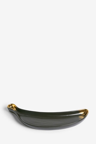 Cutout image of the Gold Banana Serving Bowl on a white background, seen from a side view.