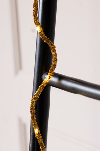 Lifestyle image of the Gold Beaded Garland with Fairy Lights