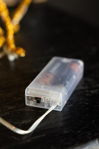 Image of the battery pack for the Gold Beaded Garland with Fairy Lights