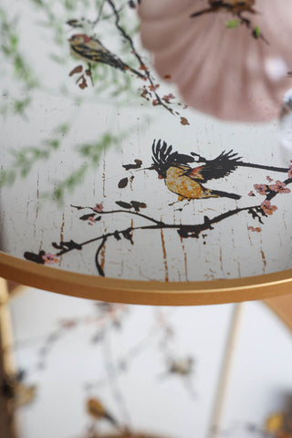 Detail image of the Gold Beautiful Birds Mirror Side Table. 