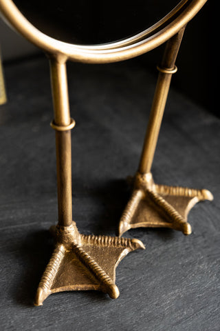 the bird legs on the Gold Bird Legs Tabletop Mirror. 