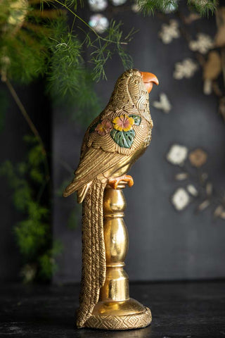 Lifestyle image of the Gloria Gold Bird Ornament