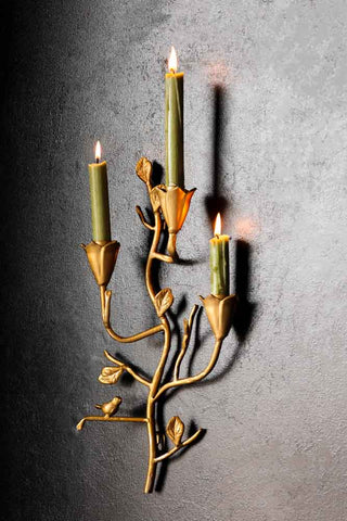 Lifestyle image of the Gold Branch & Flower Wall Candle Holder