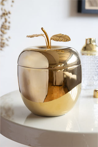 Lifestyle image of the Gold Ceramic Apple Ice Bucket