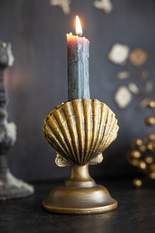 Lifestyle image of the Gold Clam Shell Candlestick Holder
