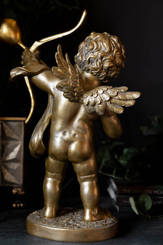 The reverse side of the Gold Cupid Table Lamp.