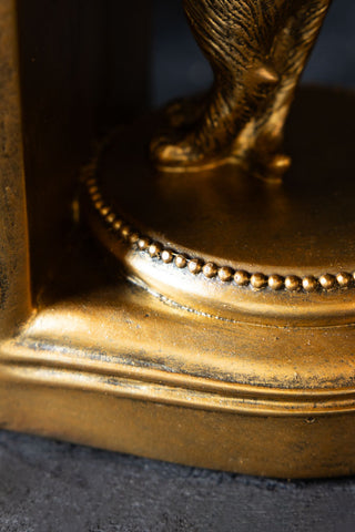 Close-up of the base of the Gold Curious Cat Bookends.