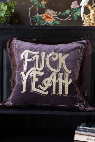 Lifestyle image of the Gold Embroidered Fuck Yeah Cushion