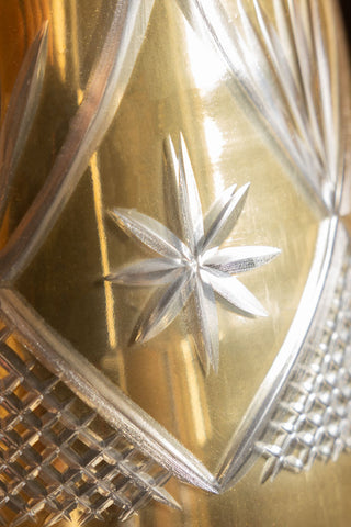 Close-up of the star design on the Gold Etched Christmas Tree Display Ornament.