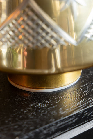 Close-up of the base of the Gold Etched Christmas Tree Display Ornament.