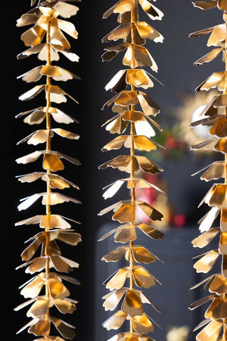 Lifestyle image of the Gold Flower Garland Christmas Decoration