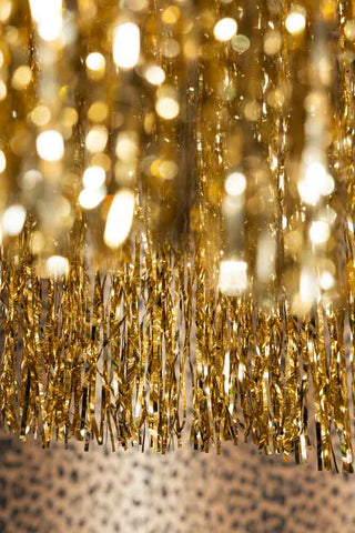 Detail of the tinsel fringe of the Gold Tinsel Fringe Chandelier Decoration. 