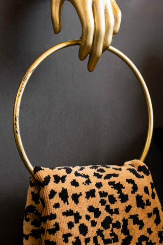 The vintage gold finish on the Gold Hand Towel Rail, shown with a leopard towel. 