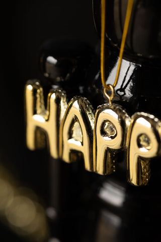 Close-up image of the Gold Happy Christmas Decoration