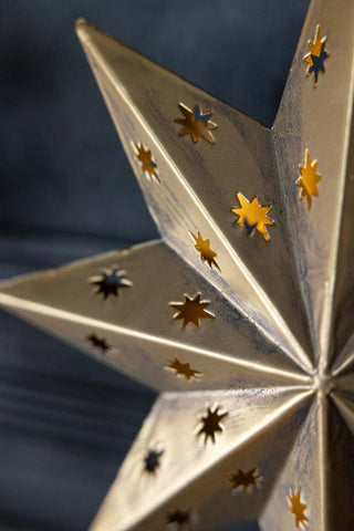 Close-up image of the Gold LED Star Light/Christmas Tree Topper