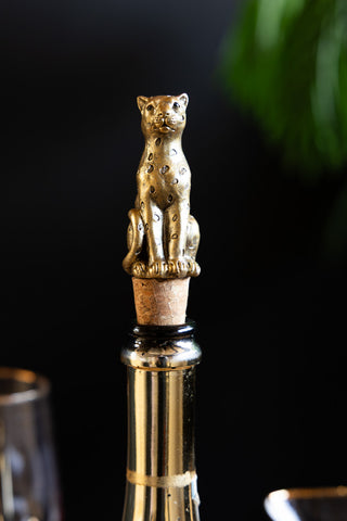 Image of the Gold Leopard Bottle Stopper in a bottle