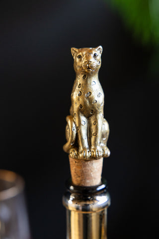 Lifestyle image of the Gold Leopard Bottle Stopper