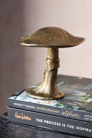 Lifestyle image of the Gold Magic Mushroom Ornament