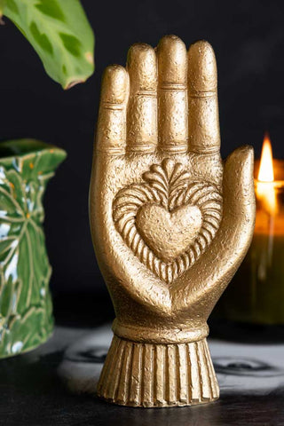 Close-up image of the Gold Milagro Heart Hand Decorative Ornament
