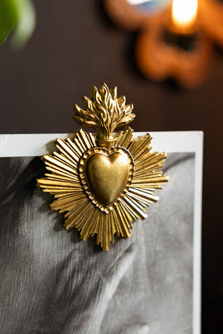 The gold sacred heart detail on the Gold Milagro Heart Photo Stand