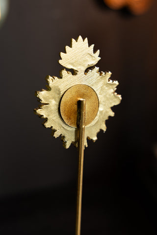 The back of the Gold Milagro Heart Photo Stand. 