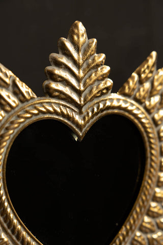 Close-up image of the Gold Milagro Heart Tabletop Mirror