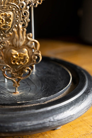 The base of the Gold Milagro Hearts Glass Dome. 