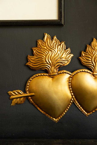 Close-up image of the Gold Milagro Lovers Hearts Ornament