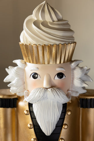 Close-up of the face of the Gold Nutcracker Butler Christmas Decoration.