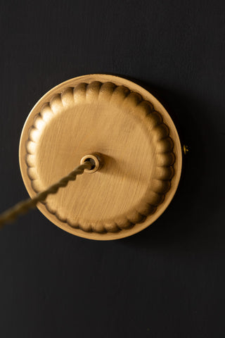 The scalloped detail of the ceiling rose on the Gold Ruched Hanging Bird Pendant Light.
