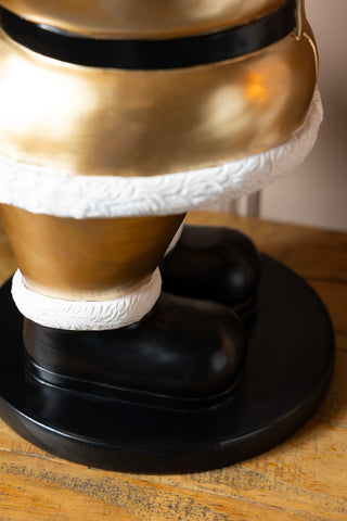 Close-up of the base of the Gold Santa Butler Christmas Decoration.