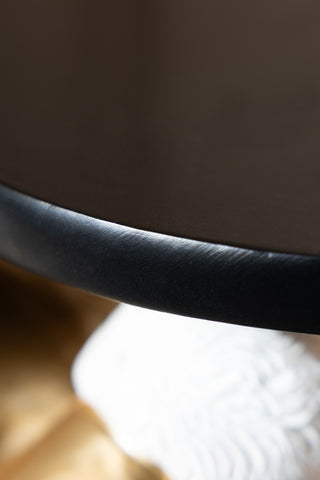 Close-up of the edge of the tray of the Gold Santa Butler Christmas Decoration.