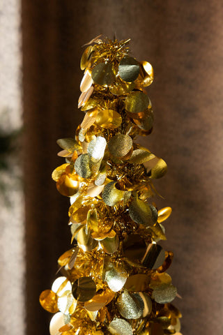 The top of the Gold Tinsel Christmas Tree Cone - Large. 
