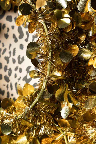Detail showing the underneath of the Gold Tinsel Sparkle Christmas Wreath. 
