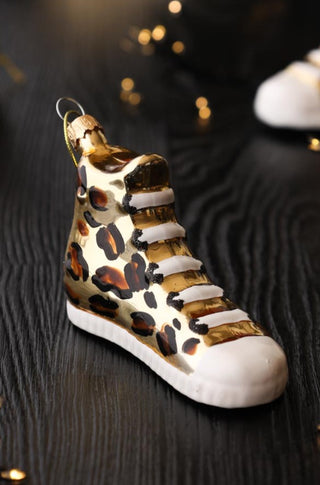 Lifestyle image of the Gold Leopard High Top Trainer Glass Christmas Tree Decoration